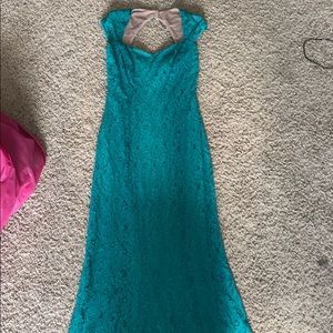 Sherri Hill turquoise classy dress.